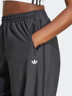 Women adidas Originals Pants & Sweats-Adilenium Season 3 Zip Track Joggers